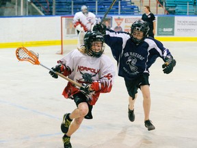 MONTE SONNENBERG Simcoe Reformer
Brodie McKnight of the Norfolk Timberwolves bantams brings the ball up the floor at Talbot Gardens Sunday during the D flight final of a lacrosse tournament. Six Nations No. 3 won that game by a 5-3 score.