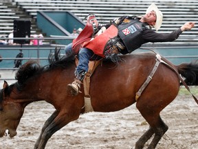 It's time for action during Quinte Rodeo at Quinte Exhibition Fairgrounds in Belleville, Ont. Sunday, June 16, 2013. JEROME LESSARD/The Intelligencer/QMI Agency