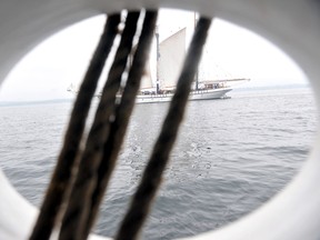The Empire Sandy is seen through the mooring ropes of the Sorlandet on Sunday afternoon, the third day of Brockville's Tall Ships Festival. (RONALD ZAJAC/The Recorder and Times)
