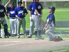 Shane Dewis of the Portage Padres gets up after sliding into home during the Padres' doubleheader against Parkland June 16. (Kevin Hirschfield/THE GRAPHIC/QMI AGENCY)