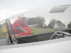 Father and son, Daniel and Jeremy Huneauld, check out the planes at the fly-in breakfast Sunday at the Cornwall Flying Club. The annual Father’s Day celebration attracted hunderds of local residents to a breakfast feast, despite the clouds and rain.
Kathryn Burnham staff photo