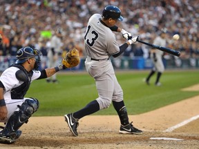 New York Yankees' Alex Rodriguez hits a fly ball to end the sixth inning against the Detroit Tigers during Game 4 of their MLB ALCS baseball playoff series in 2012. (REUTERS/Mike Cassese)