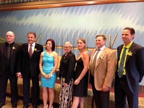 Members of the class of 2013 of the Wood Buffalo Sports Hall of Fame pose for a photo before Thursday’s induction dinner. From left to right: Ben Sauve, John Wilson, Laurie Wiltshire, and the Ewashko family (Bev, Kim, Howie and Craig). KRISTA BALSOM/SUPPLIED PHOTO