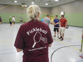 Jane Kemp monitors some of the action in Saturday's pickleball tournament at Doug Snooks Community Centre. (SUSAN GAMBLE, The Expositor)