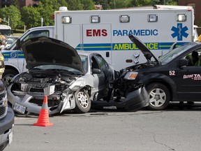 Police reporter no injuries after this two-car collision at Elm Street and Paris Ave. during morning commute. (Sebastien Perth/The Sudbury Star)