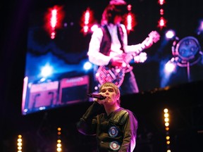 Stone Roses lead singer Ian Brown performs at Finsbury Park in London, June 8, 2013. (OLIVIA HARRIS/Reuters)