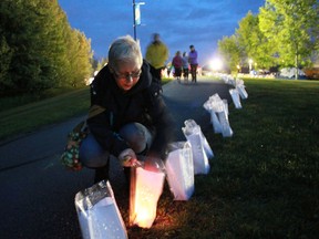 Cheryl Duncan-Molloy lights some luminaries at the Relay For Life that took place in Rotary Park overnight from June 15 to 16.
Celia Ste Croix | Whitecourt Star