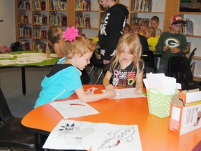 Jaelynn Thompson and Kierra Watke colour after school at Pat Hardy school as part of a trial run of a Boys and Girls Club program on Wednesday, June 12. In the fall the Boys and Girls Club will be opening a satellite branch at Pat Hardy.
Barry Kerton | Whitecourt Star