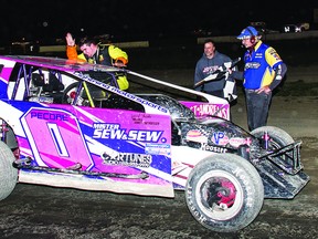 Shane Pecore celebrates his Sportsman feature win as he climbs from his car on Saturday night at Brockville Ontario Speedway. (HENRY HANNEWYK Submitted Photo)