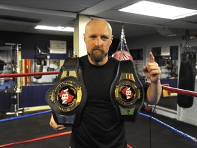 Sarnian boxer Frank "The Hammer" White shows off his recently won National Boxing Authority Canadian Cruiserweight Championship and Eastern Canadian Cruiserweight Championship belts at River City Boxing Club. BLAIR TATE/ FOR THE OBSERVER/QMI AGENCY