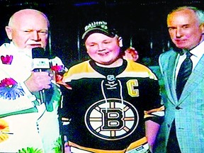 A photo from the Facebook page Jacob's Journey shows Atwood's Jacob Campbell, 14, joining Don Cherry and Ron MacLean during the opening of Hockey Night in Canada Monday night in Boston.