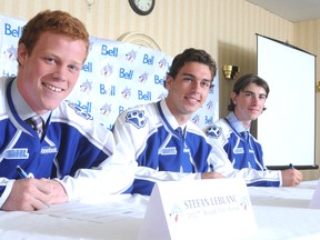 Stefan LeBlanc, Troy Timpano and Kyle Capobianco sign their contracts with the Sudbury Wolves at a press conference on Monday afternoon.
GINO DONATO/THE SUDBURY STAR