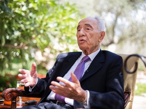 Israel's President Shimon Peres speaks during an interview with Reuters at his residence in Jerusalem June 16, 2013. (REUTERS/Baz Ratner)