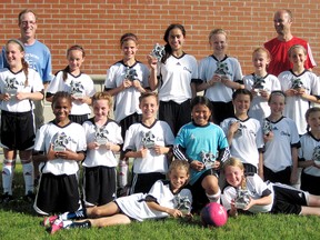 The Chatham Under-11 Strikers won the Walter Kirchner Tournament on Sunday in Woodstock. The Strikers are, front row, left: Olivia Hunter and Brooklynn Grocott. Second row: Grace Mwasalla, Maddie Turnbull, Brooke Macleod, Jaiden Rollings, Erica Anderson, Jocelyn Maryschak and Courtney Legere. Third row: Michaela Legue, Jillian Hyatt, Sophie Maine, Olivia Lozon, Camille Blain, Kirby Mackinnon and Carly Belanger. Back row: coaches Peter Mackinnon and Neil Anderson. (Contributed Photo)