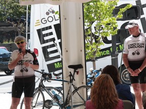 Ginny Dennehy (left) and her husband Kerry Dennehy speak to a group of people under the Whitecap Pavilion about raising awareness and the stigma of mental illness as part of their cross-Canada Enough is Enough Bike Ride.
MARNEY BLUNT/DAILY MINER AND NEWS