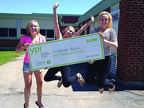 Sidney Albertson, Ana Davreaux and Michaela King jump for joy at winning the Youth and Philanthropy Initiative award. A cheque for $5,000 goes to the Interval House in Brockville.       Wayne Lowrie - Gananoque Reporter