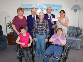 (L. to R. Back) Maryanne Garth, Mitch Spearman, Earl Armstrong with the Melfort Elks and Emily Sanderson. (Front) Jackie Marks, Glen Atkinson and Tracey Woods. The Melfort Elks donated $1,500 to the Melfort Group Home for washroom upgrades.