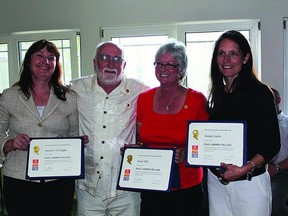 Carolyn Knight, Don Matthews, Susan Tulk and Brenda Asselin of the Gananoque Rotary Club all received Paul Harris Fellow awards at end-of-season celebrations last week.               Contributed photo