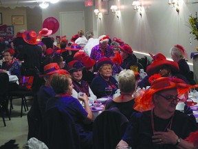 The colourful women of the Red Hat Society meet in Gananoque for lunch, drinks and conversation last week.     Wayne Lowrie - Gananoque Reporter