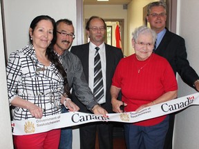 (L. to R.) Liane Dagenais of CMHC, Joe Remai of Tamarack Ventures, Melfort Mayor Rick Lang, apartment resident Pat From and Melfort MLA Kevin Phillips were on hand to cut the ribbon on Friday, June 14.