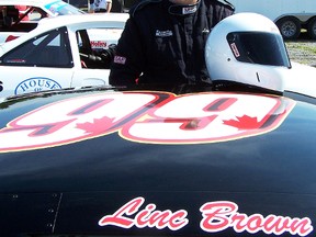 Linc Brown climbs into his #99 Late Model race car. The Colborne driver recorded his fourth straight top three finish Saturday at Canadian Tire Motorsport Park Speedway.