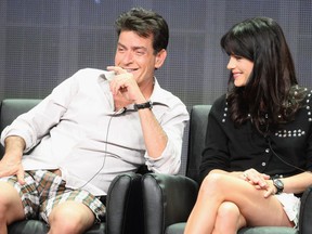 Charlie Sheen and Selma Blair speak onstage at the "Anger Management" panel during the FX portion of the 2012 Summer TCA Tour on July 28, 2012 in Beverly Hills, California. (Frederick M. Brown/Getty Images/AFP)