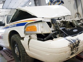 This Portage la Prairie RCMP cruiser was involved in an incident on June 5 when a suspect of an inter-provincial manhunt allegedly attempted to drive over it in a large pickup truck. (SVJETLANA MLINAREVIC/PORTAGE DAILY GRAPHIC/QMI AGENCY)