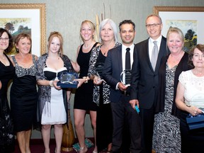 Several people were honoured at Bluewater Health's third annual Bridging Excellence awards in May. The awards recognize dedication and commitment to excellence at Sarnia and Petrolia hospitals. From left are Krista Steeves, Tracy Astolfi, Aurie Prendiville, Patient Experience Partners Hailey and Nicki, Helen Clark, Dr. Karan Shetty who accepted on behalf of his father Dr. Pandu Shetty, Dr. Nash Rashed, Leanne Gelinas and Sharon Dearing. SUBMITTED/ FOR THE OBSERVER/ QMI AGENCY