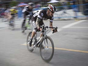 Houston Peschl of the Café Riders hammers out of a turn during the Category 4 Criterium as part of Banff Bike Fest on Saturday, June 15, 2013. Justin Parsons/ Canmore Leader/ QMI Agency