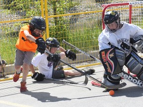 KEVIN RUSHWORTH HIGH RIVER TIMES/QMI AGENCY. The Fury in the Foothills street hockey tournament was a huge success for organizers. Close to 240 kids took part in numerous games on June 15 and 16 at the Boston Pizza parking lot in High River.