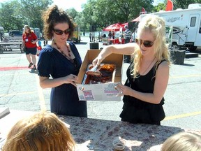 Serving up tasty ribs at last year's Blues and Ribfest in Stratford. (SCOTT WISHART, The Beacon Herald files)