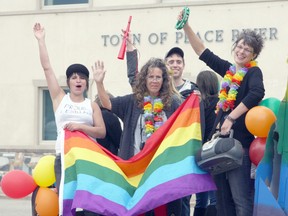 Michaela Hiebert/R-G

Members of the Peace River Regional LGBT Pride Commitee wave from their float at the tail-end of the pride parade that 100 people took part in, at noon on Saturday June 15. The parade was a part of a weekend long celebration and show of support for LGBT individuals in the Peace Region. In this photo: Ally Larson, Sherry Hilton, Matt Belliveau and Erin Steele. For more photos, see the newspaper.