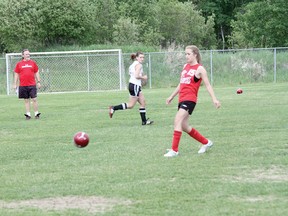 Coach Iain Davidson-Hunt (left) runs drills with the Kenora Athletic Soccer U16 girls team at Tom Nabb Park in Kenora. The team is one of two competing for the first time in the Winnipeg Youth Soccer Association.
LLOYD MACK/Daily Miner and News