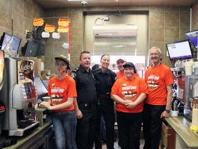 Tim Hortons staff was joined by volunteers of all walks of life to raise funds for the 2013 Camp Day.  Photo by Dawn Lalonde/Mid-North Monitor/QMI Agency.