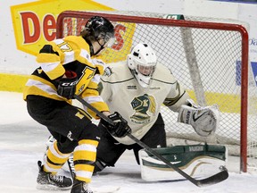 Kingston Frontenac Ryan Kujawinski lifts a backhand shot at London Knights goalie Anthony Stolarz during an Ontario Hockey League game at the K-Rock Centre in Kingston on Jan. 27, 2013. Kujawinski is ranked No. 63 among North American skaters heading in the NHL Entry Draft in Newark, N.J., on June 30.