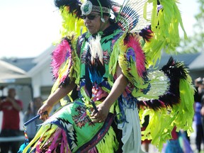 Fancy feather dancer Jojo Maness, 19, dances at the mini powwow. TYLER KULA/ THE OBSERVER/ QMI AGENCY