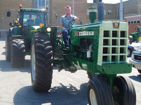 Some students at WCI marked the last day of the year by driving their tractor to school. Kurtis Oliver led the pack to lunch ontop his antique Oliver tractor. 
TARA BOWIE / SENTINEL-REVIEW / QMI AGENCY