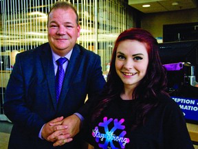 Mackenzie Murphy, an anti-bullying advocate, poses with Mayor...