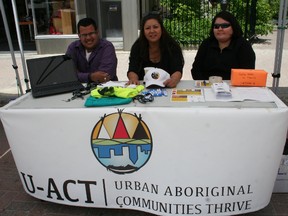 Darus Ramoutar, from left, Sheila Courston and Unnie Koosees, with the Timmins Native Friendship Centre were providing information about the Urban Aboriginal Communities Thrive program on the opening day of the Urban Park in Downtown Timmins Wednesday.