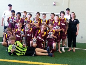 The Woodstock Trojans under-12 boys team captured gold in their division at the 21st annual Walter Kirchner tournament this weekend. The Trojans won in dramatic fashion needing penalty kicks in their quarter-finals, semifinals and final game. The annual tournament saw 102 teams compete across 10 divisions, including nine teams from Woodstock and one from Ingersoll. (Submitted photo)