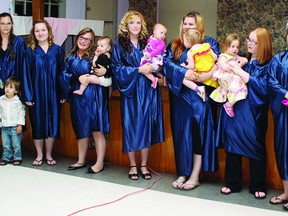 TINA PEPLINSKIE    The Young Parent Support Program offered by Columbus House celebrated its graduation Wednesday. Receiving their diplomas (from left) were Niomy Hogan, with Seth; Courtney Clouthier; Hailey Fitzpatrick with Harmony; Kayla Kosnaski with Aeyva, Alex Lapierre with Ava, Hailey McKee with April and Stephanie Frotten with Grace.