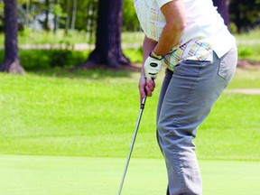 TINA PEPLINSKIE  Sheila Perras sinks a putt during the golf event at the Pembroke Golf Club that was part of the Renfrew County Senior Games, which wrapped up two weeks of activities June 14.