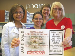 Pharmasave pharmacist owner-manager Janette Pinson, left, and pharmacy assistants Angela Morns, Michelle Pardey and Mary Stuart hold a poster for a June 29 bake sale in support of Alzheimer Society of Elgin-St. Thomas.
