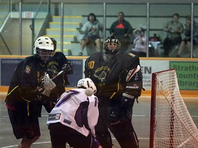 The ball caroms safely away from the net during the Sherwood Park Titans Junior B Tier I team’s recent 18-7 loss to the NAMLC Crude at the Sherwood Park Arena. The Titans, who saw many of their players move up to the new Junior A team in the Park, are last in their division with a 1-11 record. Photo by Shane Jones/Sherwood Park News/QMI Agency