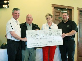 Alliance Pipline donated $40,000 to Camp He Ho Ha at the George Vanderburg golf tounament on June 14. The donation will be used to buy a multi-person van. From left: George VanderBurg, Whitecourt-Ste Anne MLA; Gord Johnson, Alliance Pipeline Whitecourt area manager; Joan Nielson, executive director of Camp He Ho Ha; Tony Straquadine, Alliance Pipeline manager of government affairs.
Celia Ste Croix | Whitecourt Star