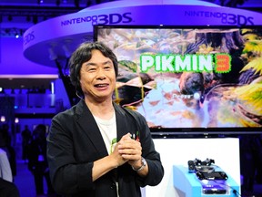 Japanese video game designer Shigeru Miyamoto talks about "Pikmin 3" during the Wii U Software Showcase at E3 in Los Angeles, California June 11, 2013. REUTERS/Gus Ruelas