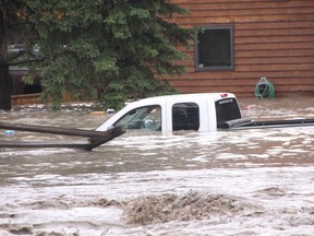 KEVIN RUSHWORTH HIGH RIVER TIMES/QMI AGENCY. High River issued a state of emergency this morning as the Highwood River burst its banks