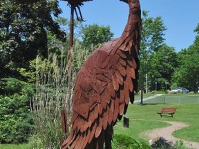 The Confederation Park Sculpture Gallery, spanning both sides of the Gananoque River behind the town’s Tourist Information Centre, is home to Wolfe Island artist Bruce Mellon’s larger-than-life Blue Heron sculptures.