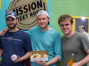 Phil Robinson, Alex Robinson and Mike Barber of Mission Street North are making what they call "The best burritos north of the border" out of
their food truck. (SAM KOEBRICH For The Whig-Standard)