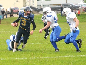 Diana Rinne/Daily Herald-Tribune
Grande Prairie Drillers quarterback Daniel Chrenek looks for an open lane as the Drillers took on the St. Albert Stars in Alberta Football League action last weekend in Sexsmith.